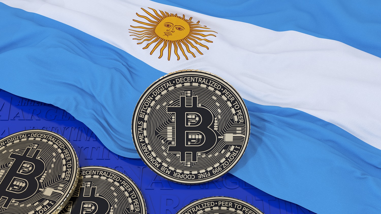 A number of metal coins intended to represent Bitcoin tokens rest on the Argentinian flag.