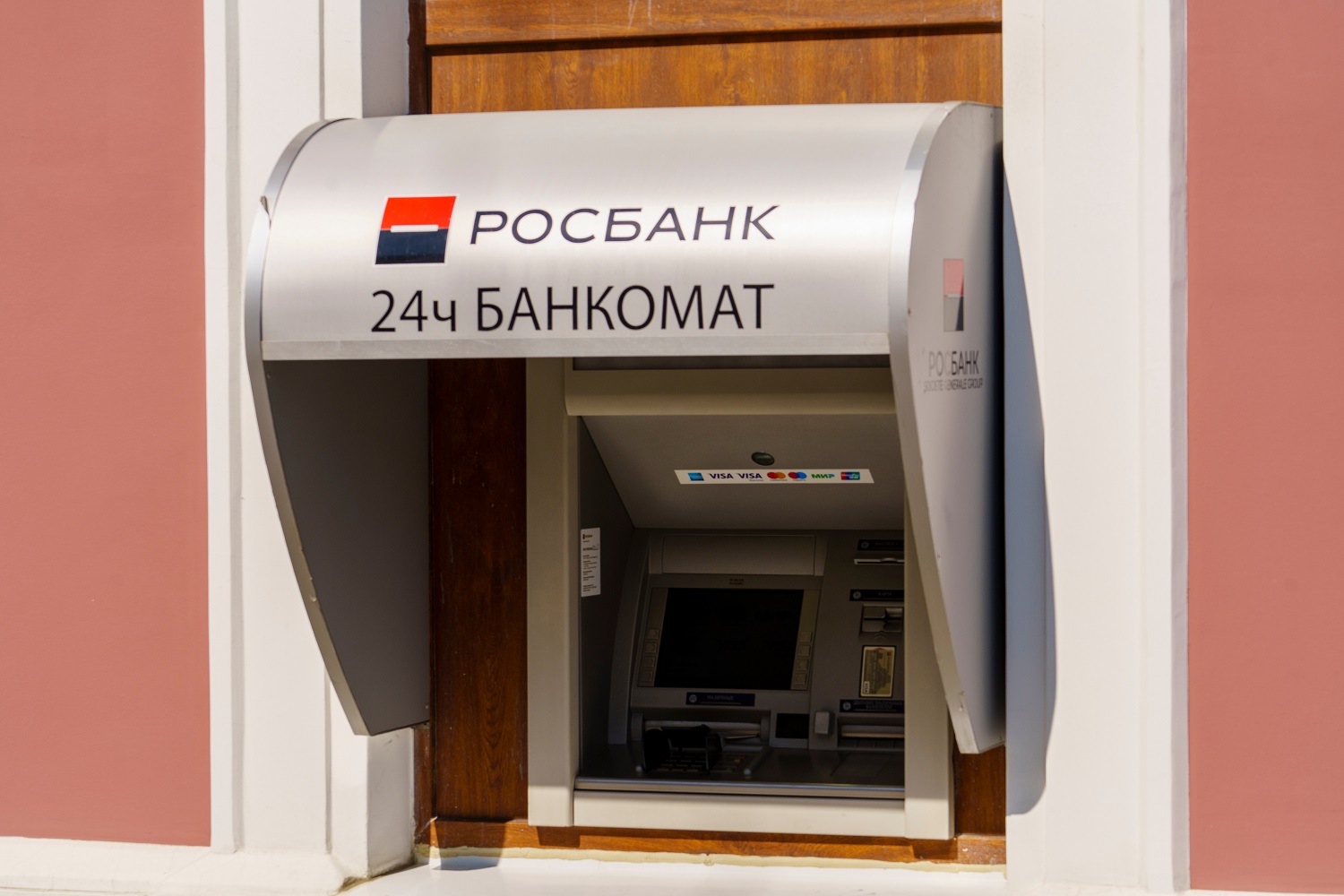 A Rosbank ATM on an urban building in Russia.
