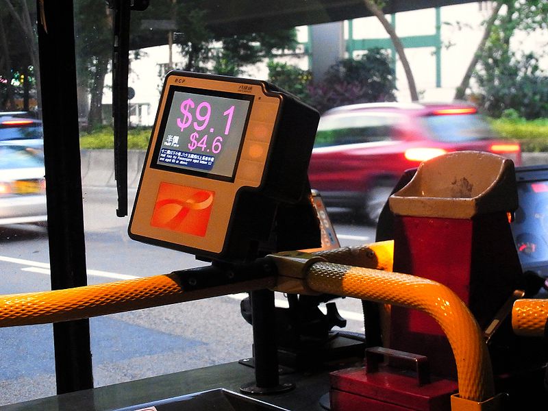 An Octopus app and card reader on a Hong Kong bus.