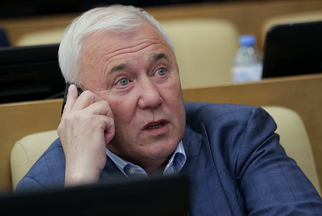The Russian lawmaker Anatoly Aksakov speaking on a mobile phone, photographed in 2021.