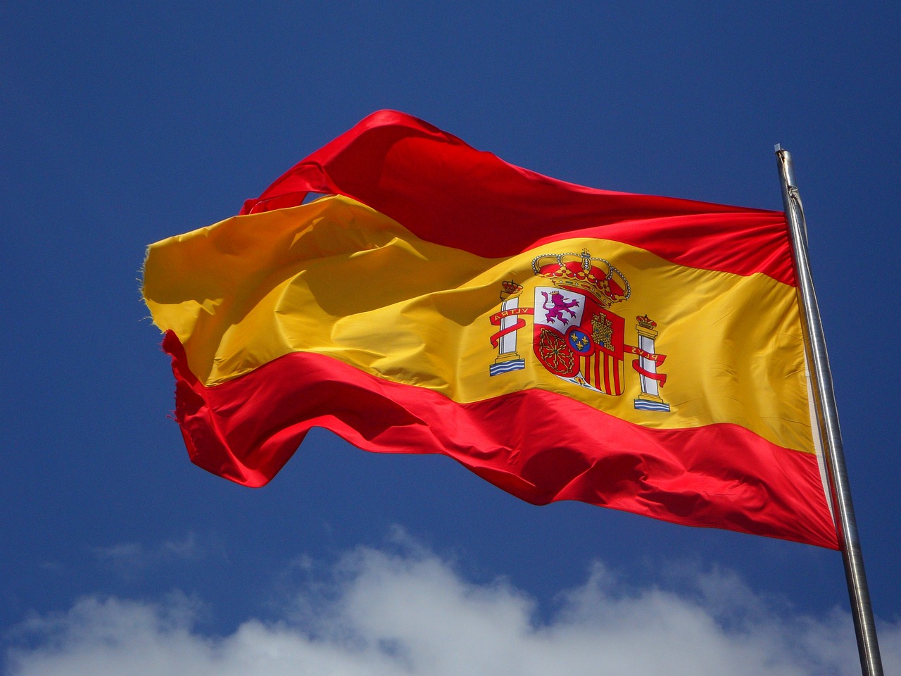 Coinbase expandiert nach Spanien und erhält wichtige Lizenz