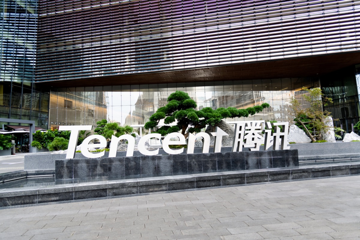 The Tencent logo outside a Chinese office building.