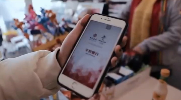 Merchants at the recent China Import and Export Fair use the digital yuan to make and receive payments.