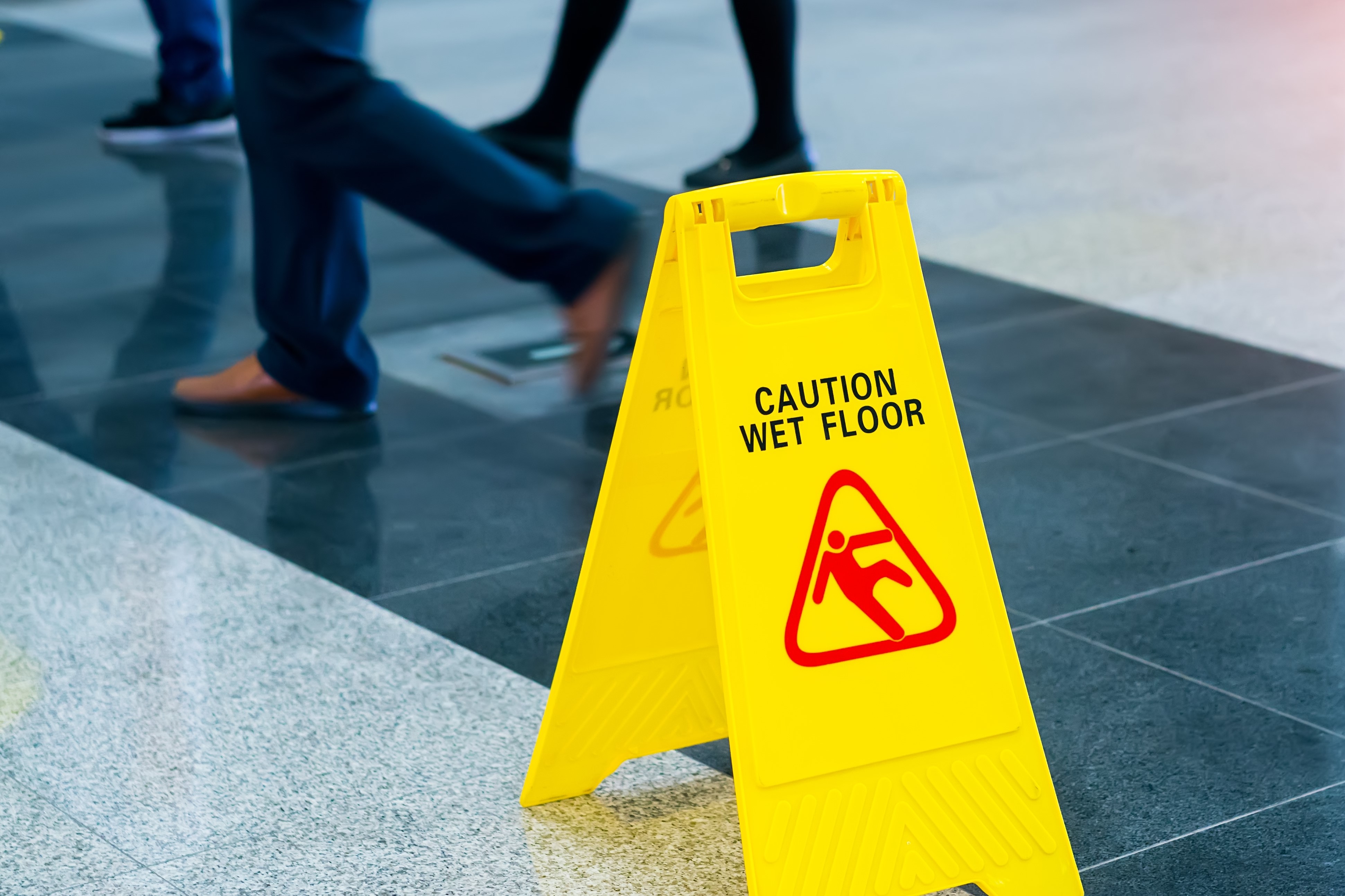 Public liability. Preventing Slips trips and Falls in the workplace. Wet Floor. Liability insurance. Caution Tempered Glass Handle with Care.