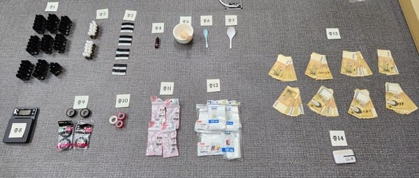 Cash and narcotics-related items seized by Busan Police Agency officers.