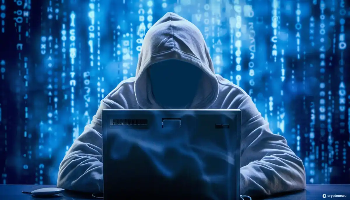 Poloniex Hacker in a white hoodie working with a Laptop