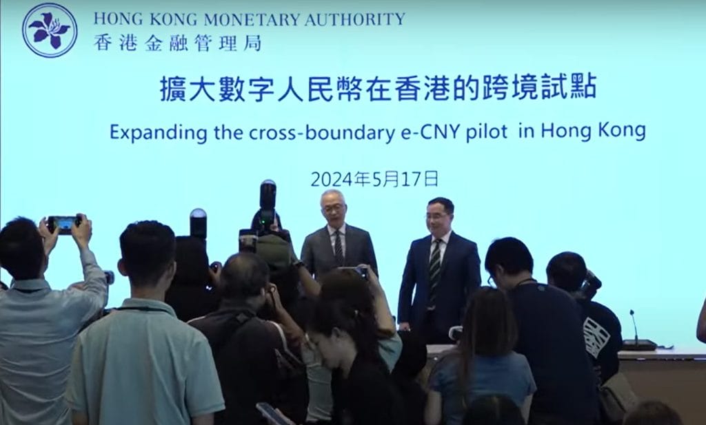 Officials from the Hong Kong Monetary Authority hold a digital yuan-themed press conference in May 2024.