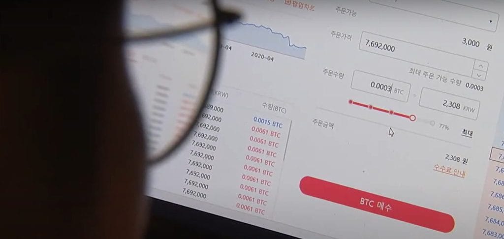 A South Korean crypto exchange customer trades Bitcoin.