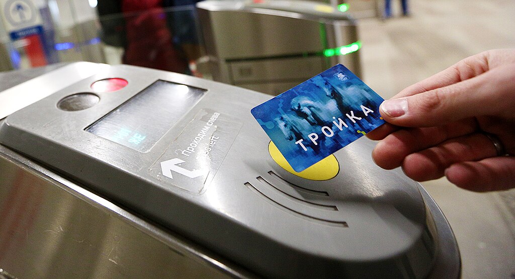 A commuter uses a Troika smartcard to pay at a ticket barrier on the Moscow Metro system.