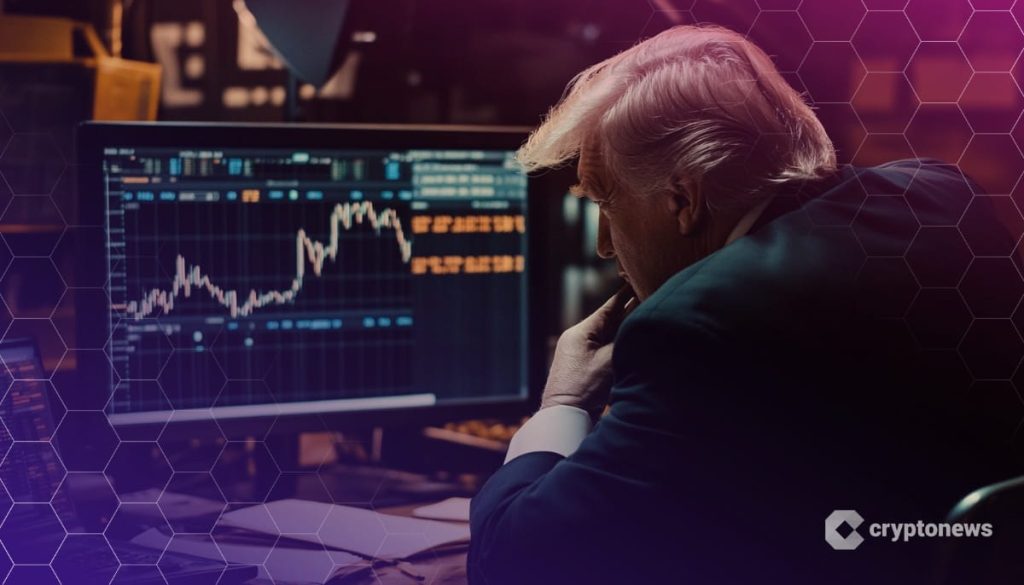 trump-token kuvassa trump istuu tietokoneen äärellä.