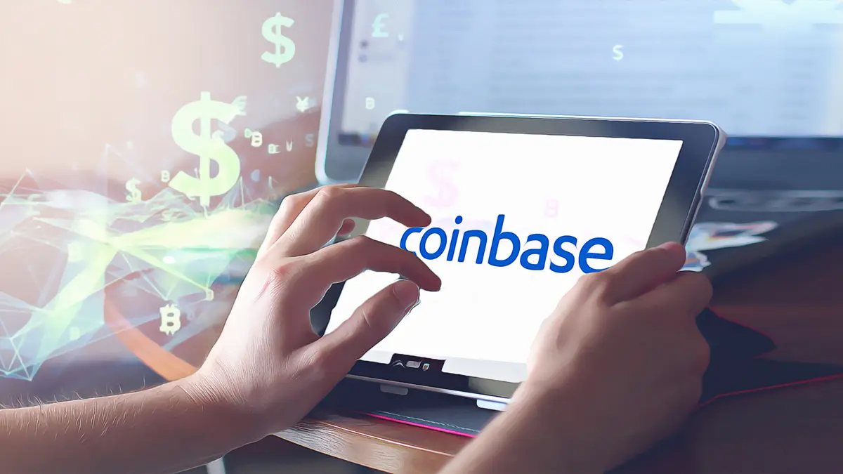 Person accessing Coinbase on a tablet with financial graphics in the background.