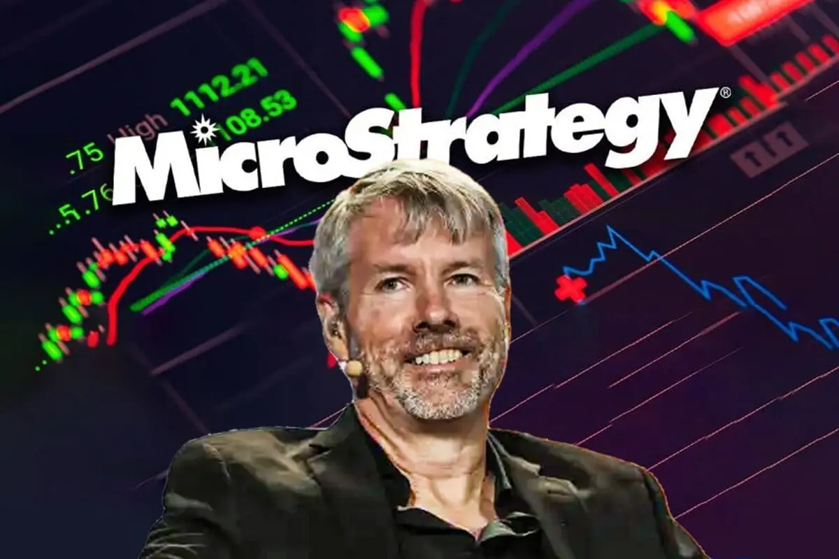 A laptop, Bitcoin coins, and a financial indicators chart on a desk.