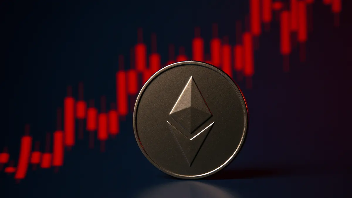 Ethereum coin with declining price chart showing market correction and downward trend