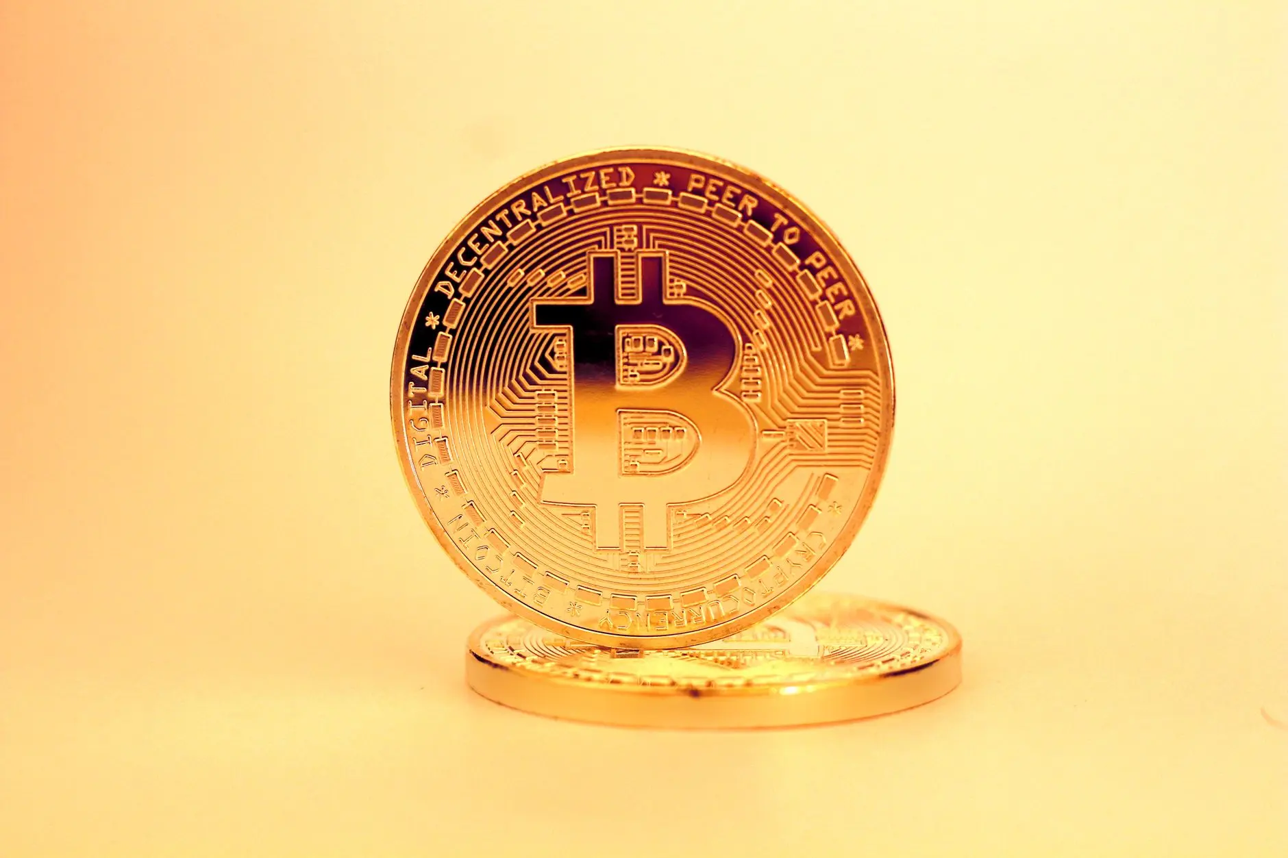 Close-up of a Bitcoin coin showcasing its detailed design.