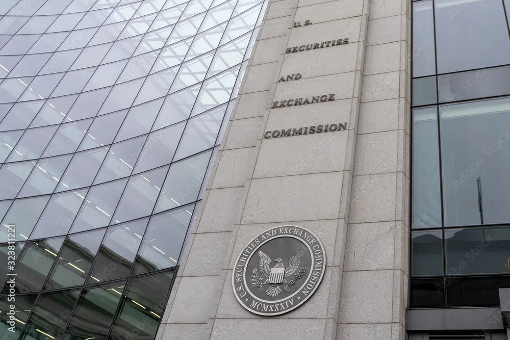U.S. Securities and Exchange Commission building with logo and name on facade.