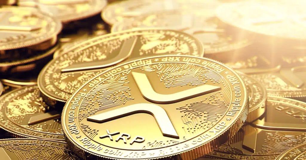 เหรียญ XRP ส่องแสงกลางภาพกราฟสามเหลี่ยมที่กำลังขึ้น 26-09-2025