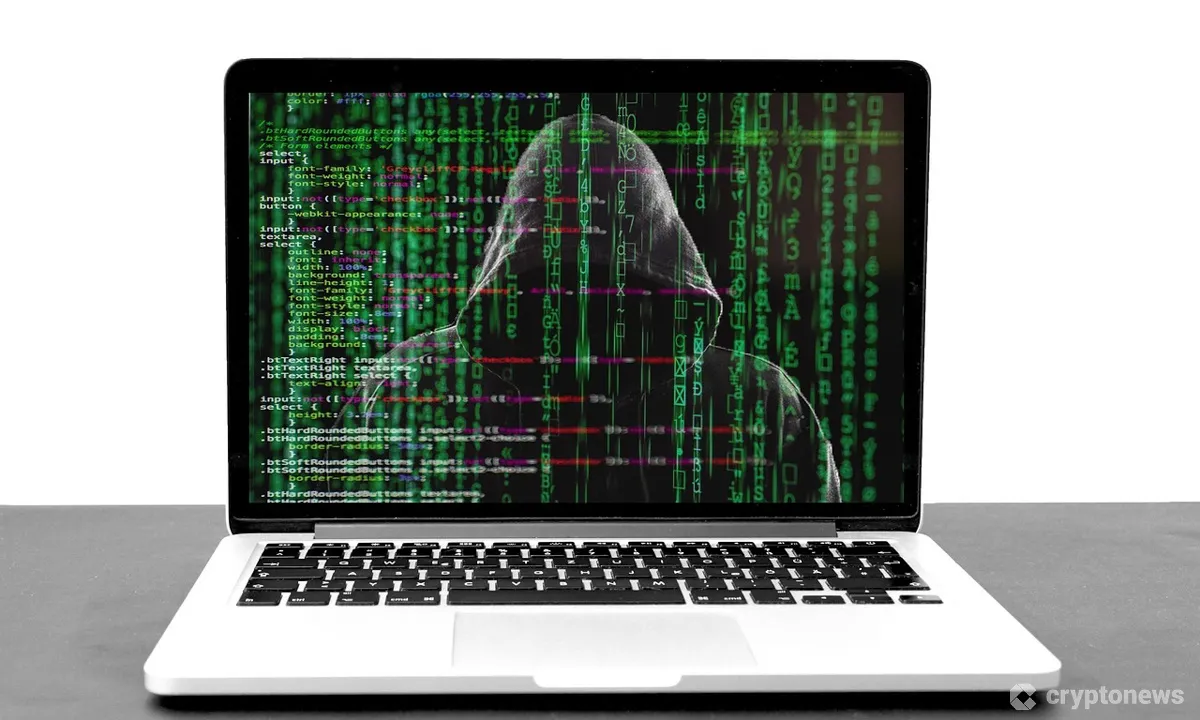 ノートパソコンに写るハッカー