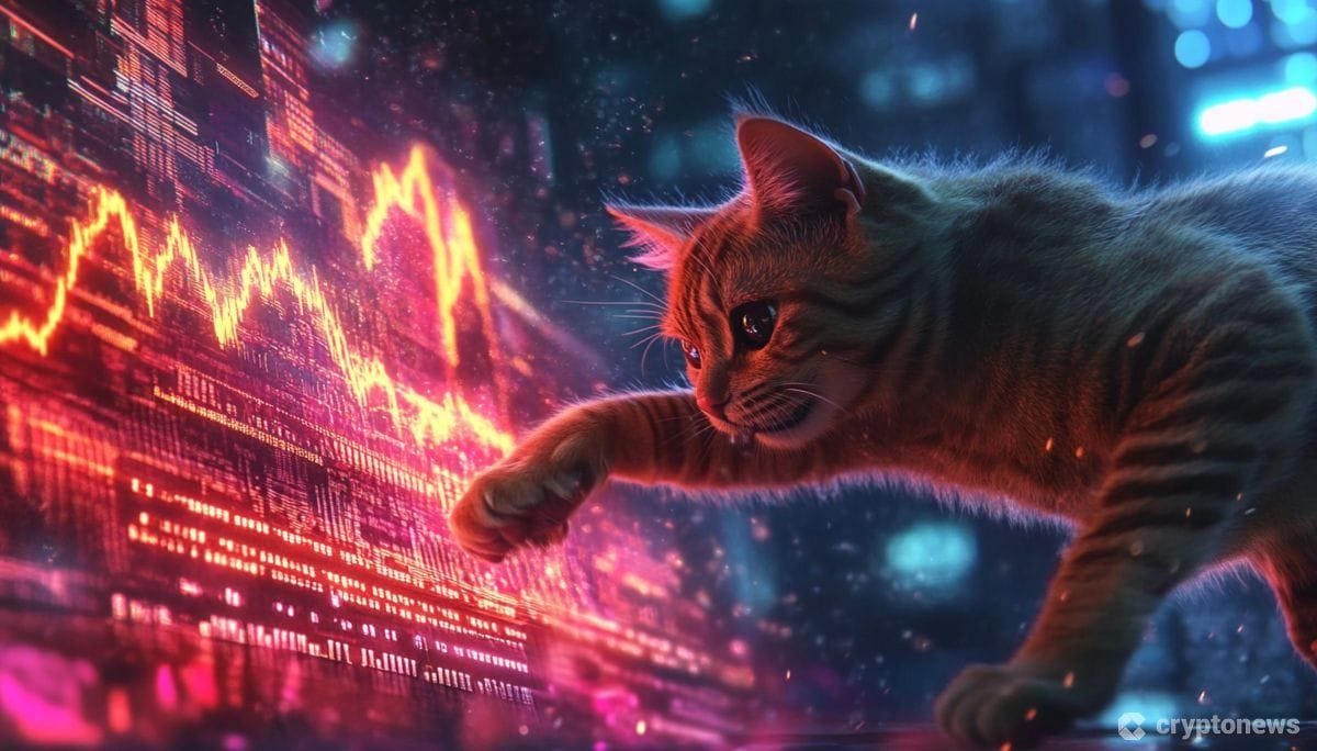チャートに猫パンチする猫