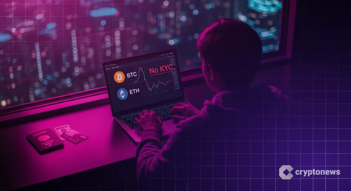 夜のオフィスでノートPCを見る匿名の仮想通貨トレーダー