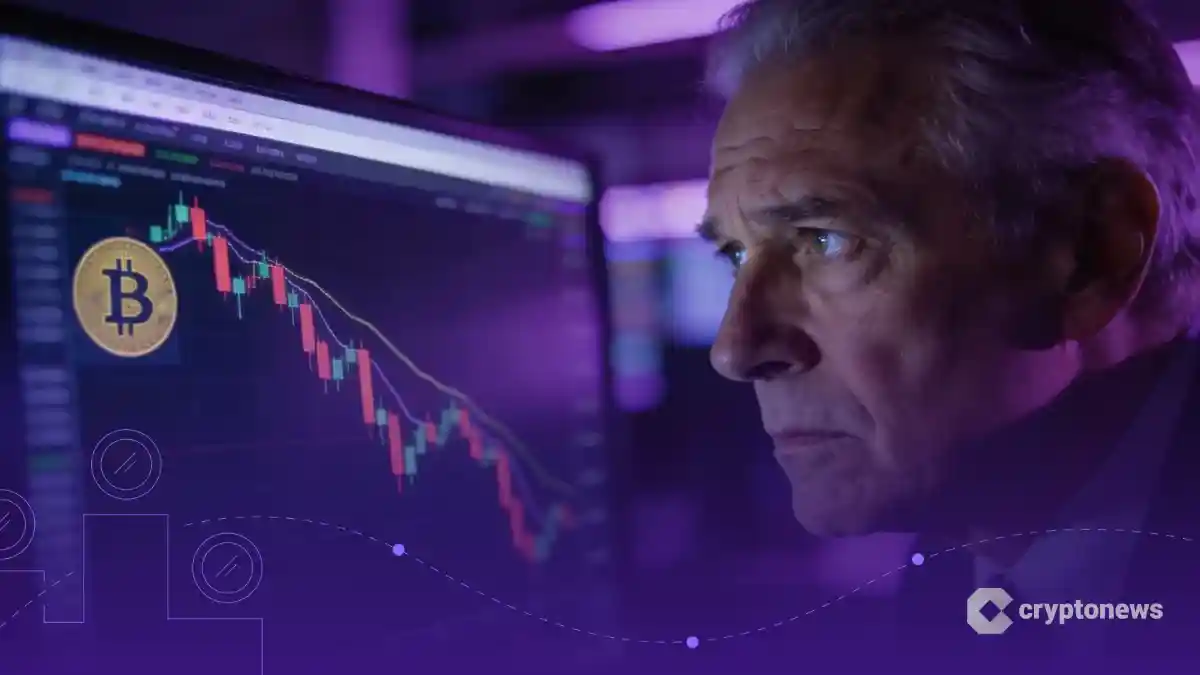 ビットコインの下落チャートを懸念の表情で見つめる金融アナリスト