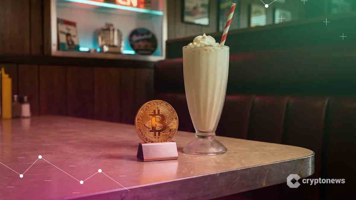 メリカンダイナーのカウンターにあるシェイクと輝くビットコイン